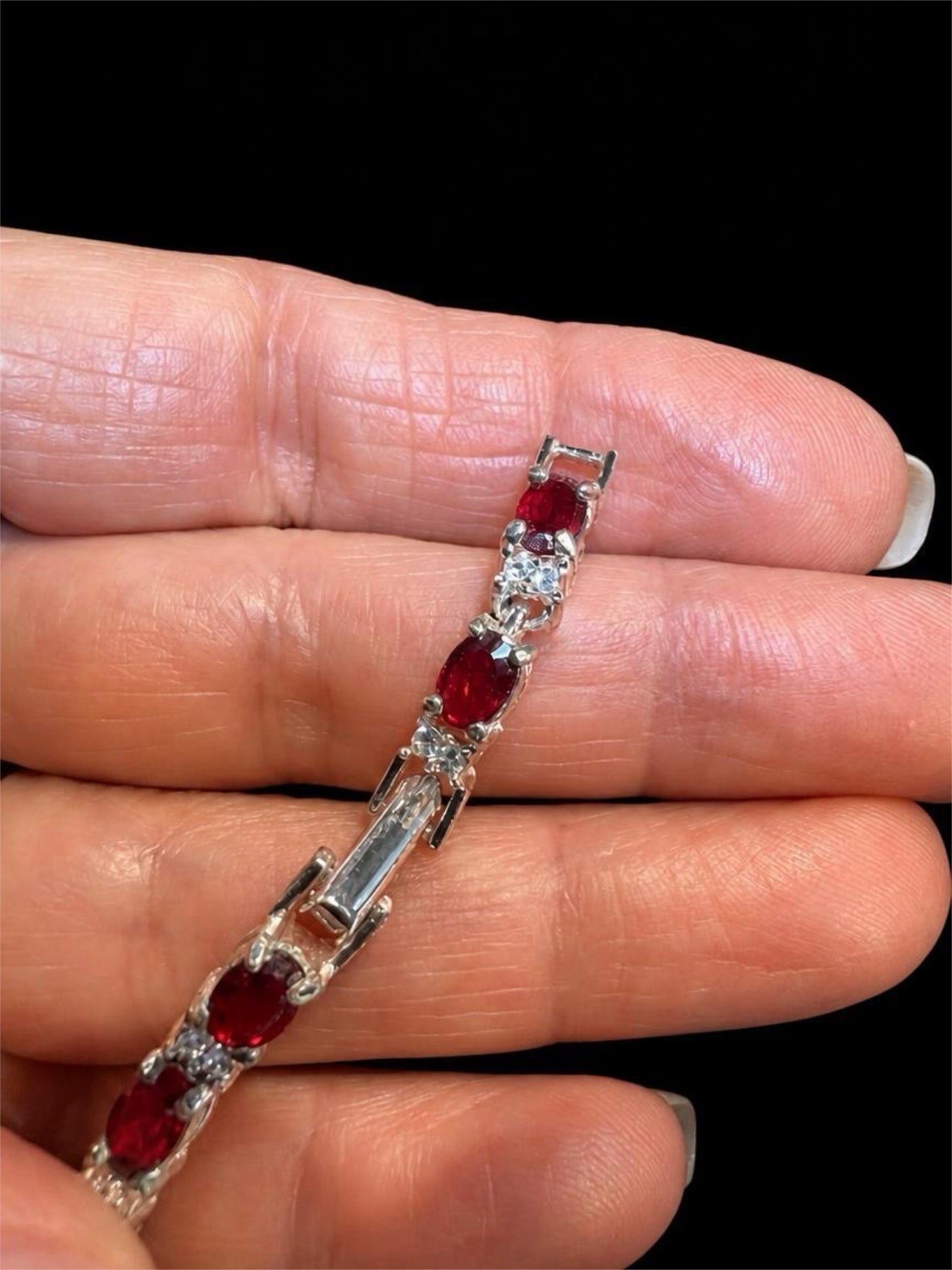 AVON RED RHINESTONE BRACELET