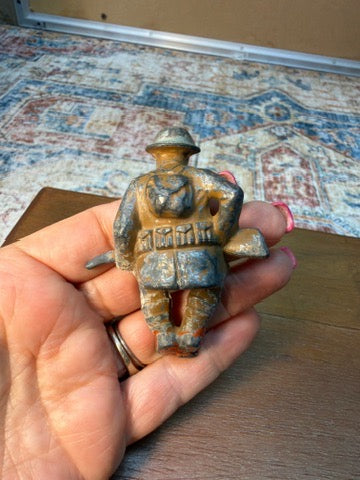1930'S M59 MANOIL TOY SITTING SOLDIER