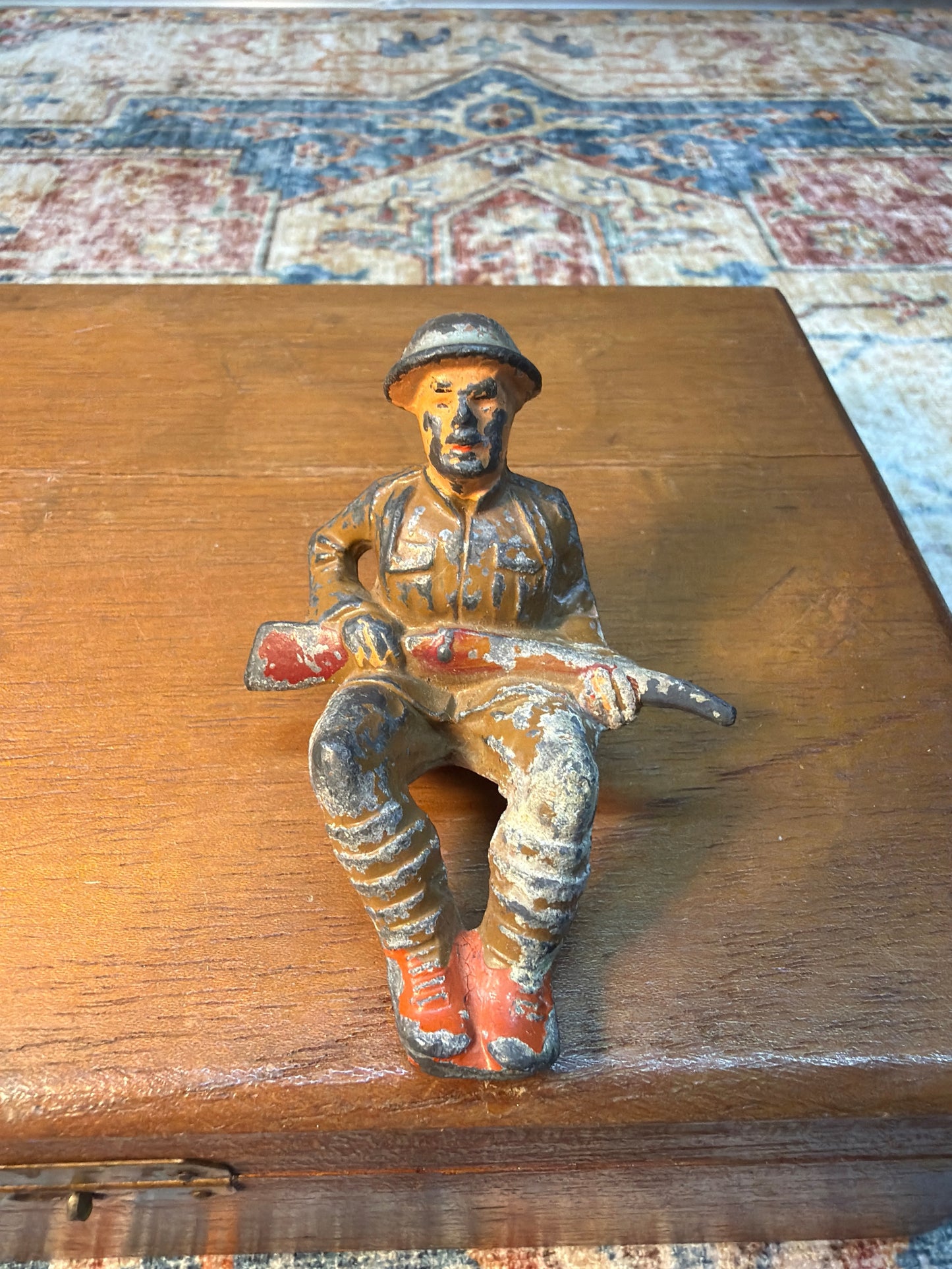 1930'S M59 MANOIL TOY SITTING SOLDIER