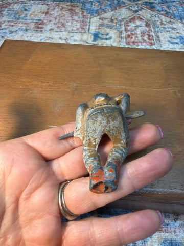 1930'S M59 MANOIL TOY SITTING SOLDIER